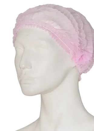 Rosa Einweghaube aus Vliesstoff auf Kopfmodell, Hygienebedarf für Medizin und Pflege