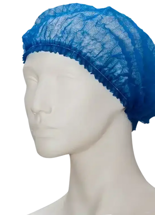 Blaue Einweg-Haube aus Vliesstoff auf Modellkopf, ideal für Hygiene und Medizinbedarf