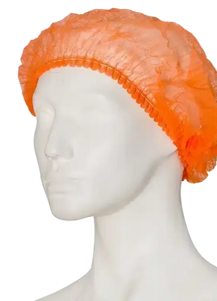 Orange Einweghaube aus Vliesstoff auf Modellkopf, Hygienehaube für Medizin und Pflege