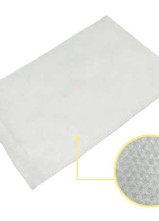 Weiße Einmal-Waschhandschuhe aus Vliesstoff, Nahaufnahme der Oberflächenstruktur, Hygieneprodukt