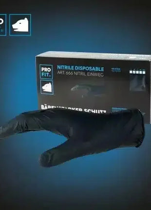 Schwarzer Nitril-Einweghandschuh vor Verpackung, medizinischer Einmalhandschuh Hygiene