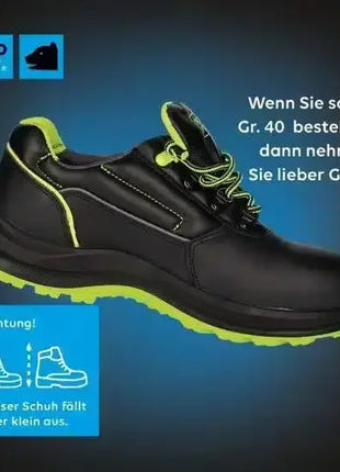 Schwarzer Sicherheitsschuh mit grünem Akzent, rutschfeste Sohle, Arbeits- und Hygieneschutz