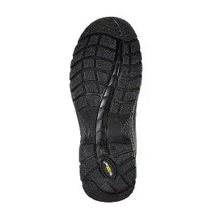 Rutschhemmende schwarze Sohle eines Arbeitsschuhs, Vibram-Logo sichtbar, für Hygiene und Arbeitsschutz